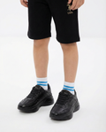 Gucci - Junior Black Sneakers with Embossed Details and Thick Sole