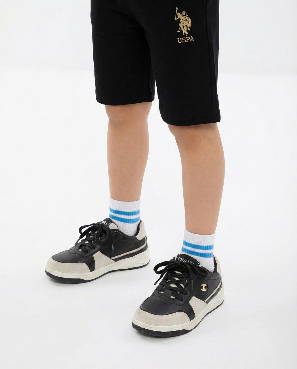 Chanel - Kids' Two-Tone Leather & Suede Sneakers – Black/White