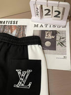 Louis Vuitton Men's Black Sweatpants with Bold White Side Stripe