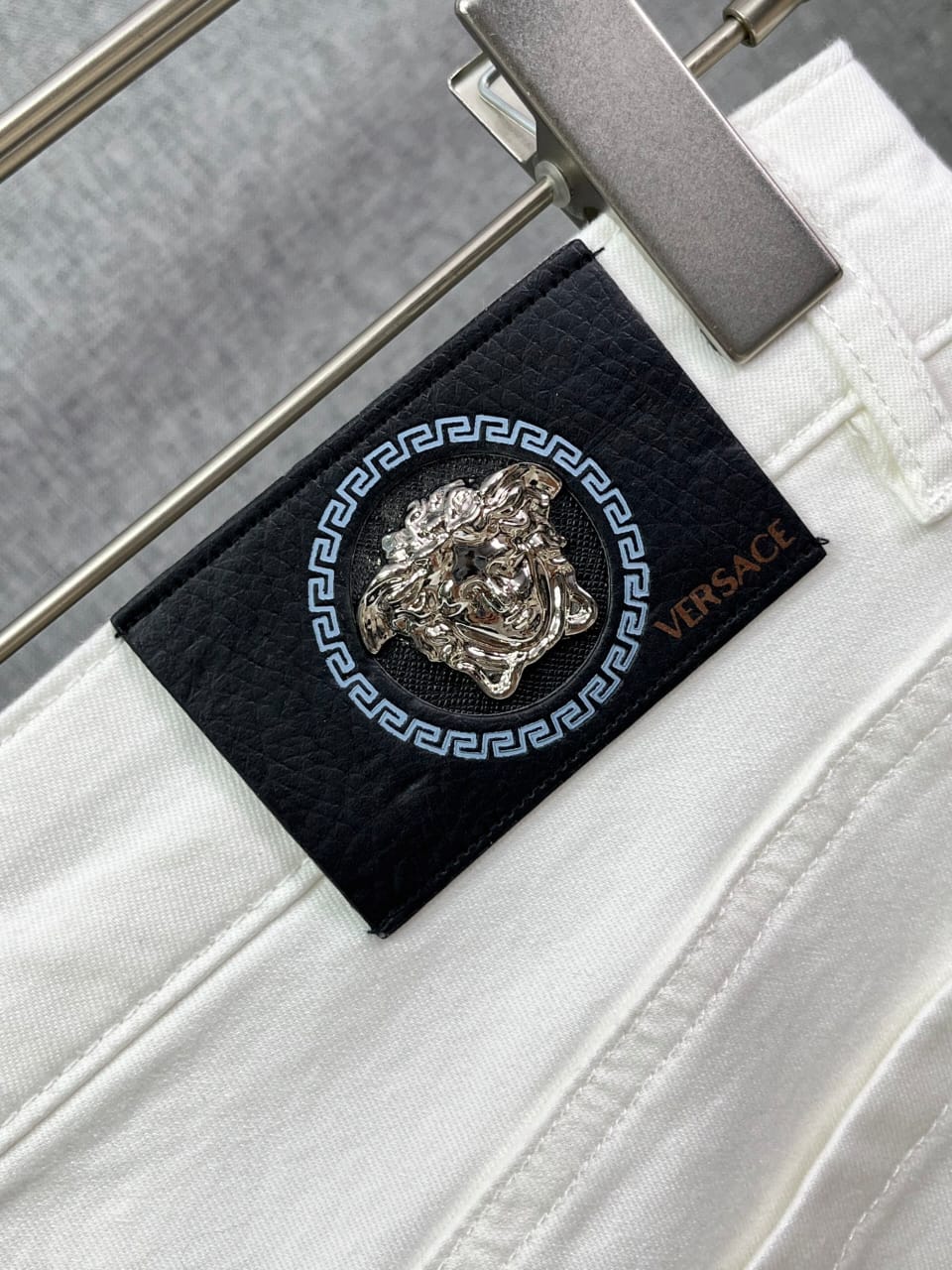 Versace - Men's White Slim-Fit Jeans with Gold Medusa Embroidery