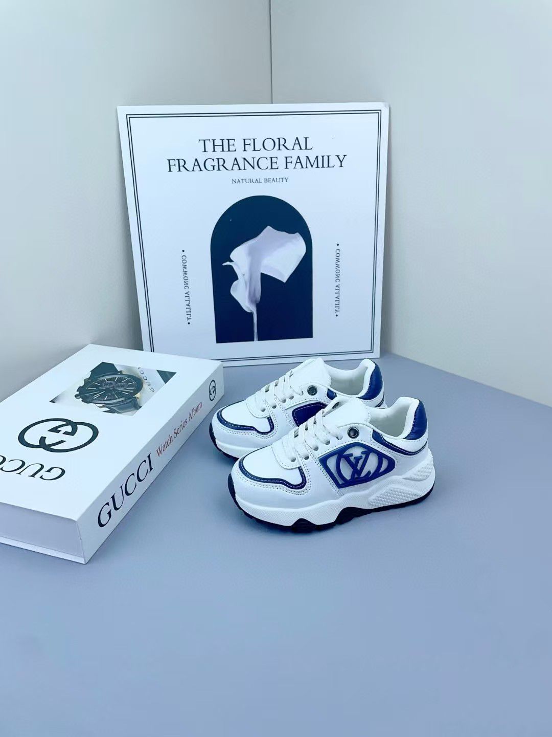 Louis Vuitton - Junior Low-Top Sneakers | White Leather with Blue Monogram Detail