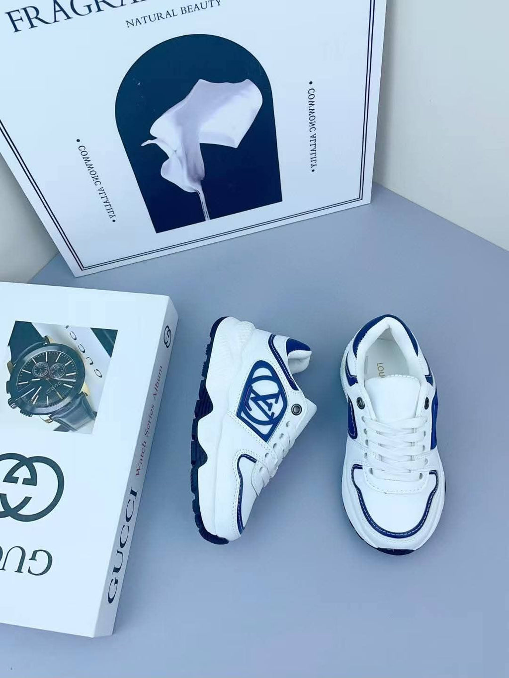 Louis Vuitton - Junior Low-Top Sneakers | White Leather with Blue Monogram Detail