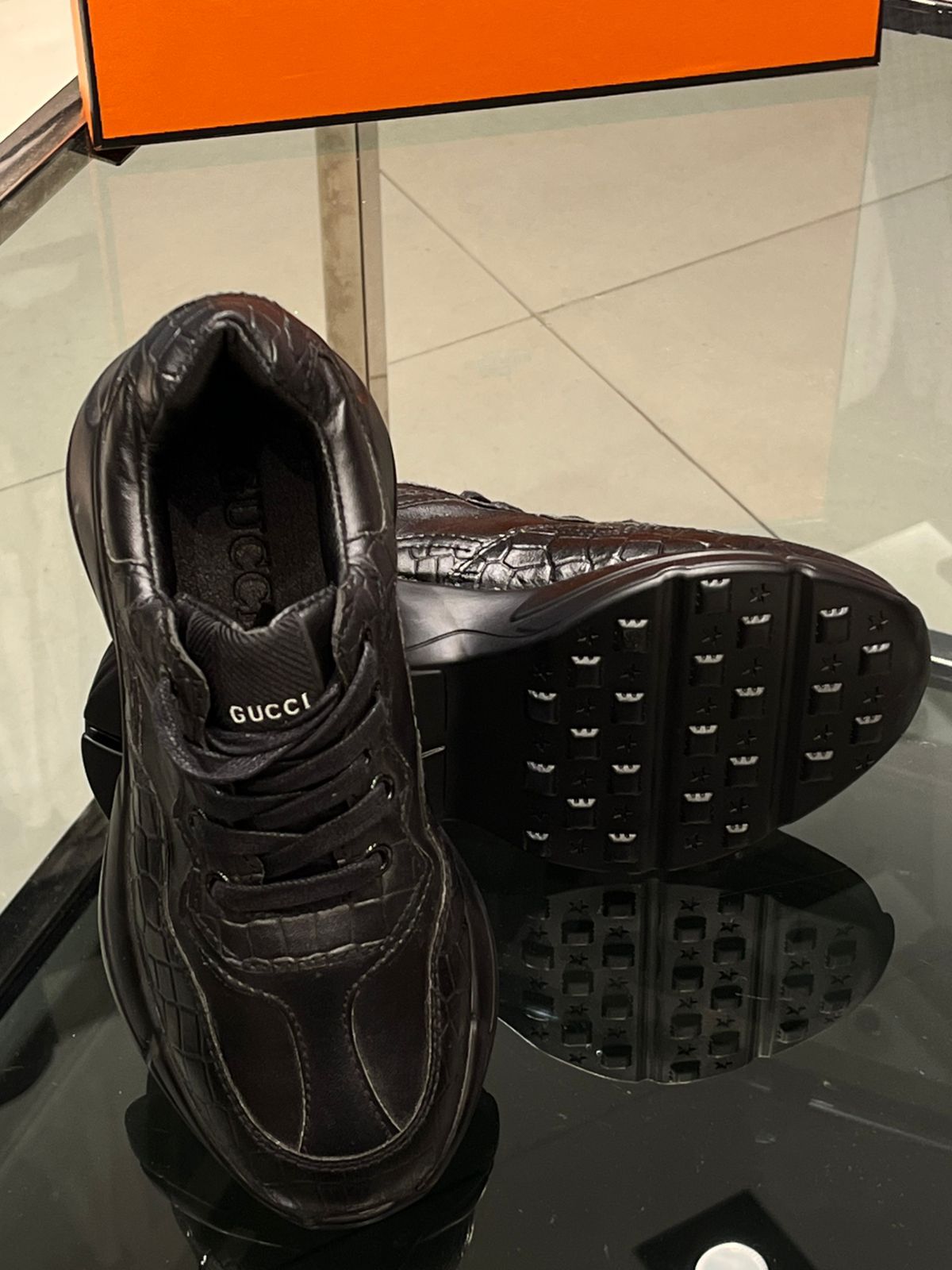 Gucci - Junior Black Sneakers with Embossed Details and Thick Sole