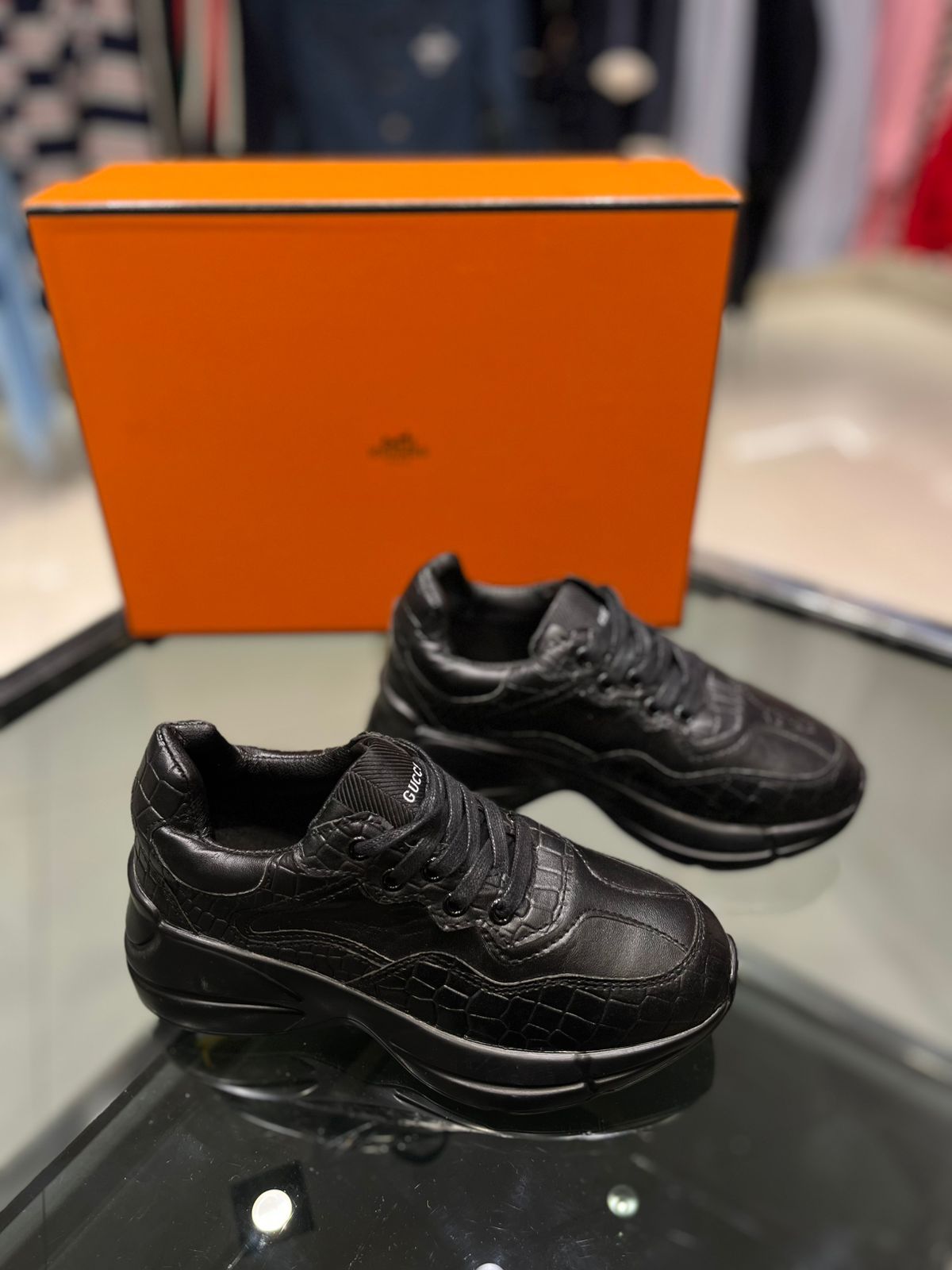 Gucci - Junior Black Sneakers with Embossed Details and Thick Sole