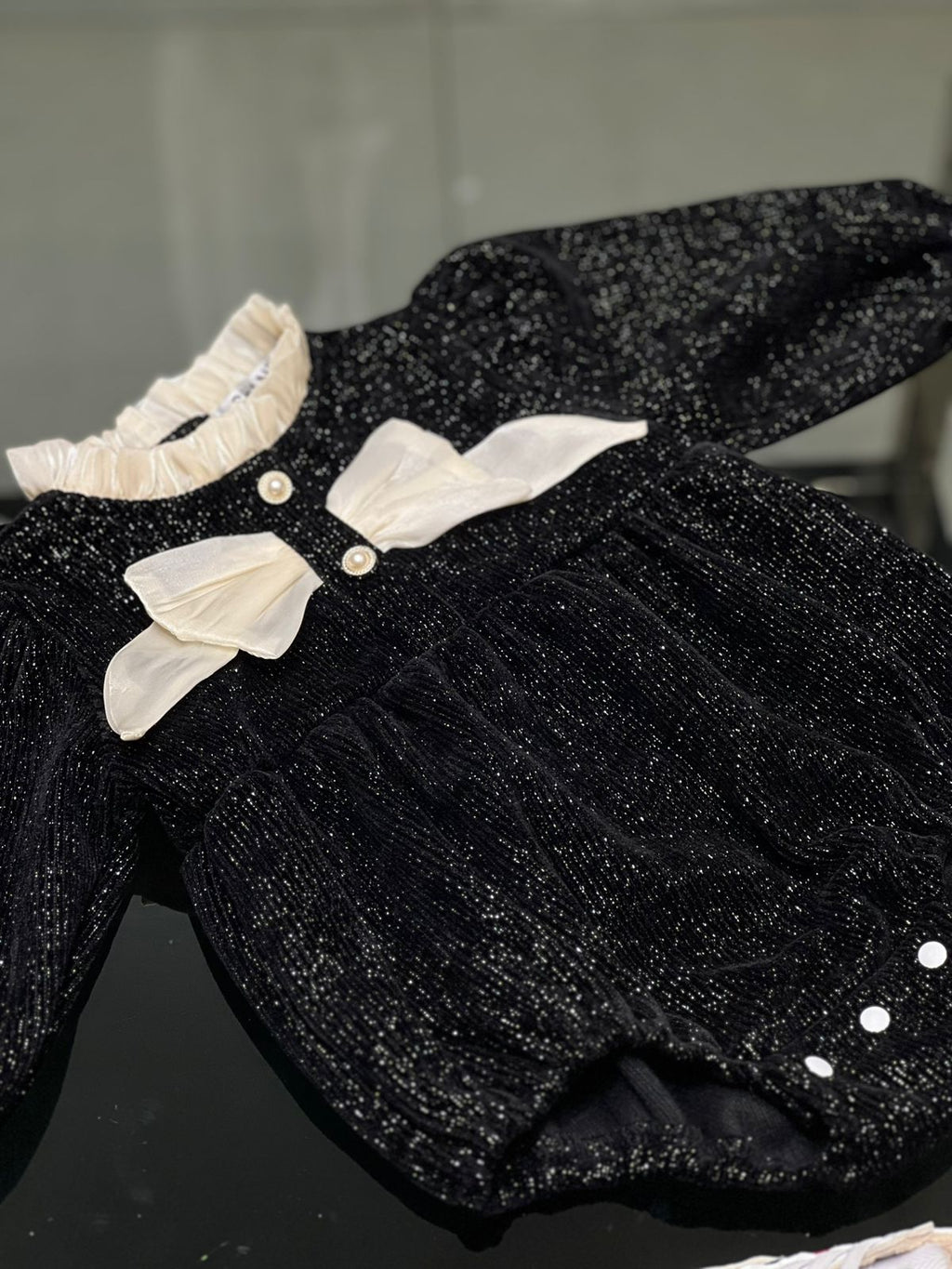 Chanel - Baby Black Shimmer Knit Romper with Ruffle Collar & Dual Silk Bows