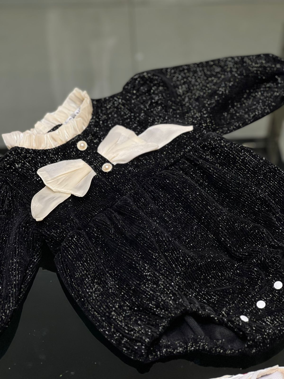 Chanel - Baby Black Shimmer Knit Romper with Ruffle Collar & Dual Silk Bows