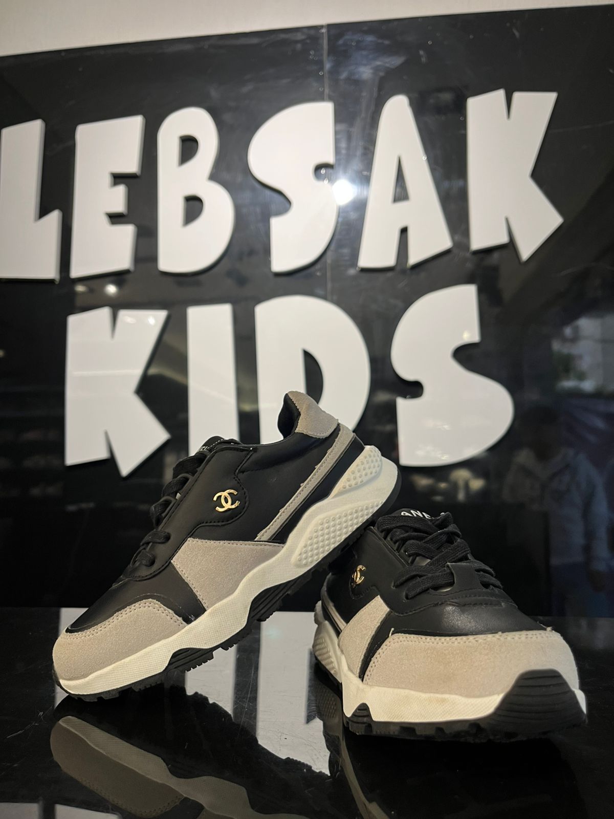 Chanel - Kids' Two-Tone Leather & Suede Sneakers – Black/White