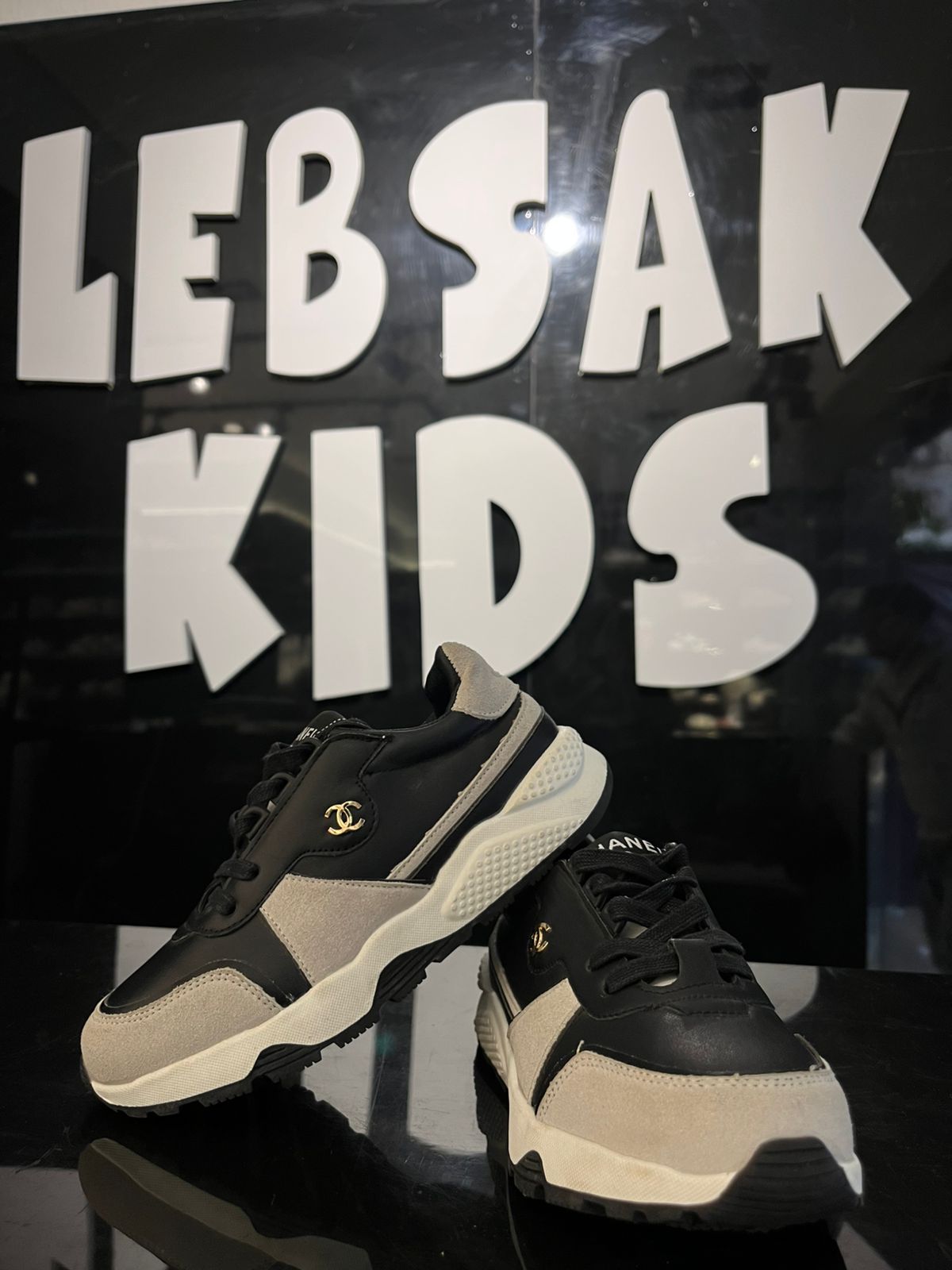 Chanel - Kids' Two-Tone Leather & Suede Sneakers – Black/White