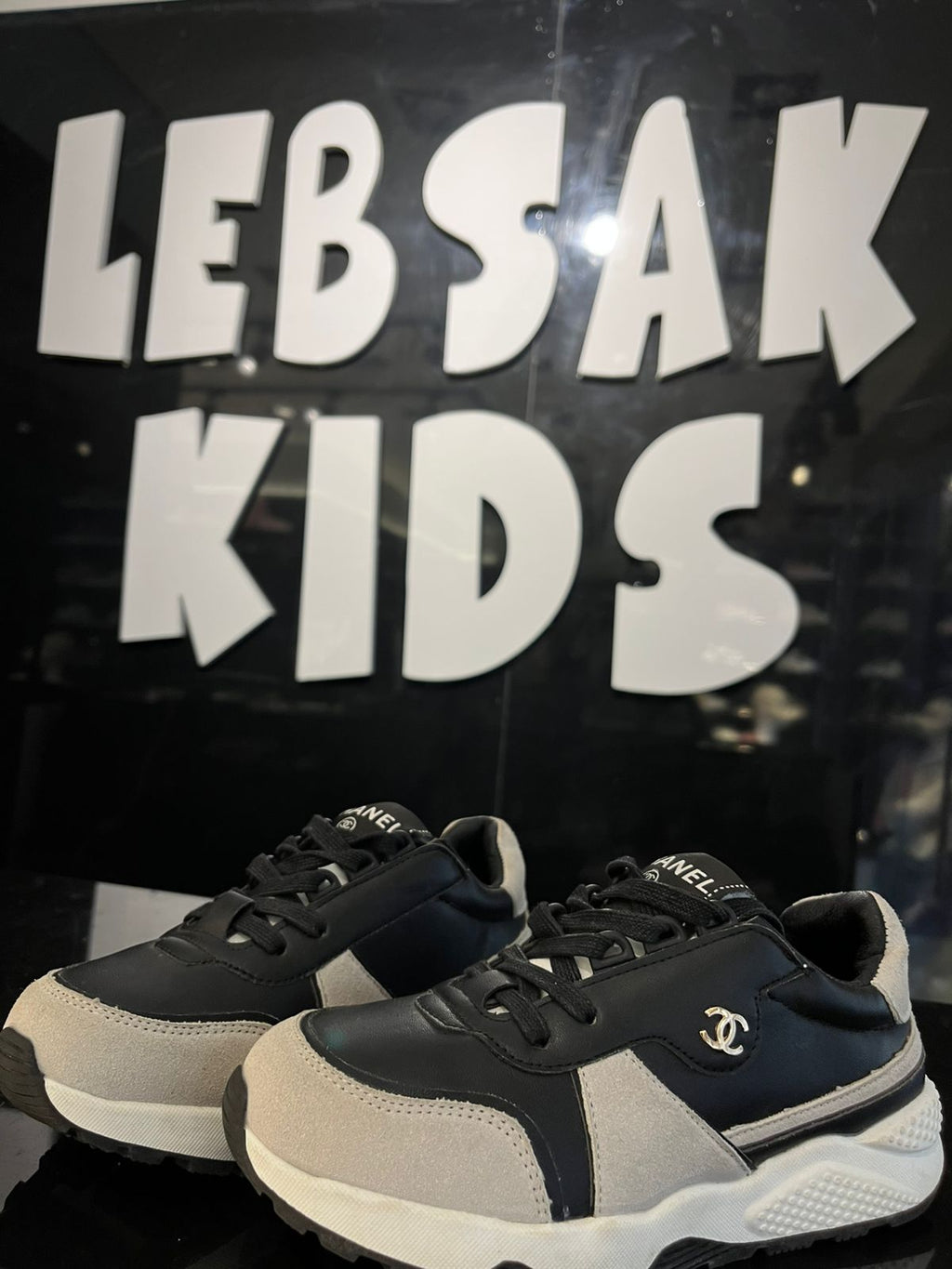 Chanel - Kids' Two-Tone Leather & Suede Sneakers – Black/White
