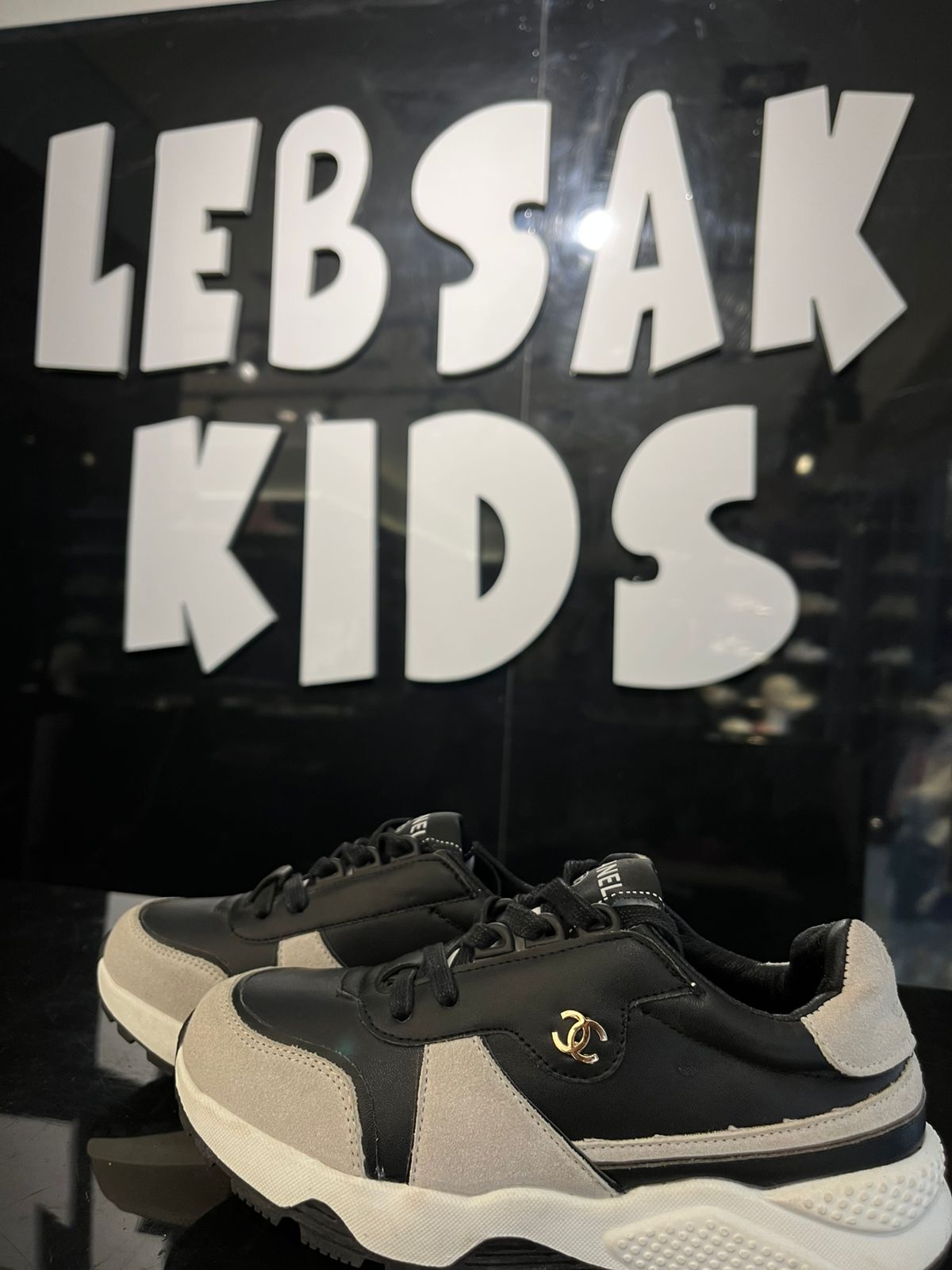Chanel - Kids' Two-Tone Leather & Suede Sneakers – Black/White