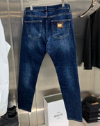 Dolce & Gabbana - Men’s Slim-Fit Distressed Jeans with Gold-Tone Logo Plaque