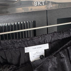 The Row Textured Silk-Blend Wide-Leg Trousers – Midnight Black