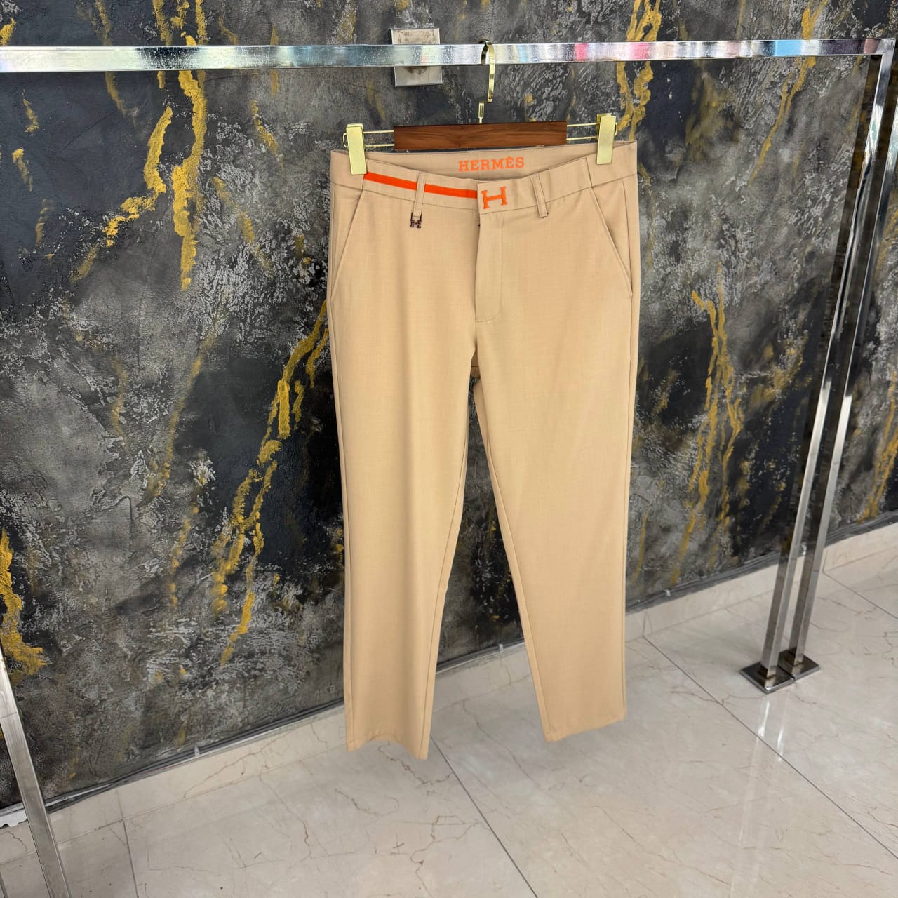 Hermès - Classic Beige Tailored Trousers with Signature Orange "H" Detail
