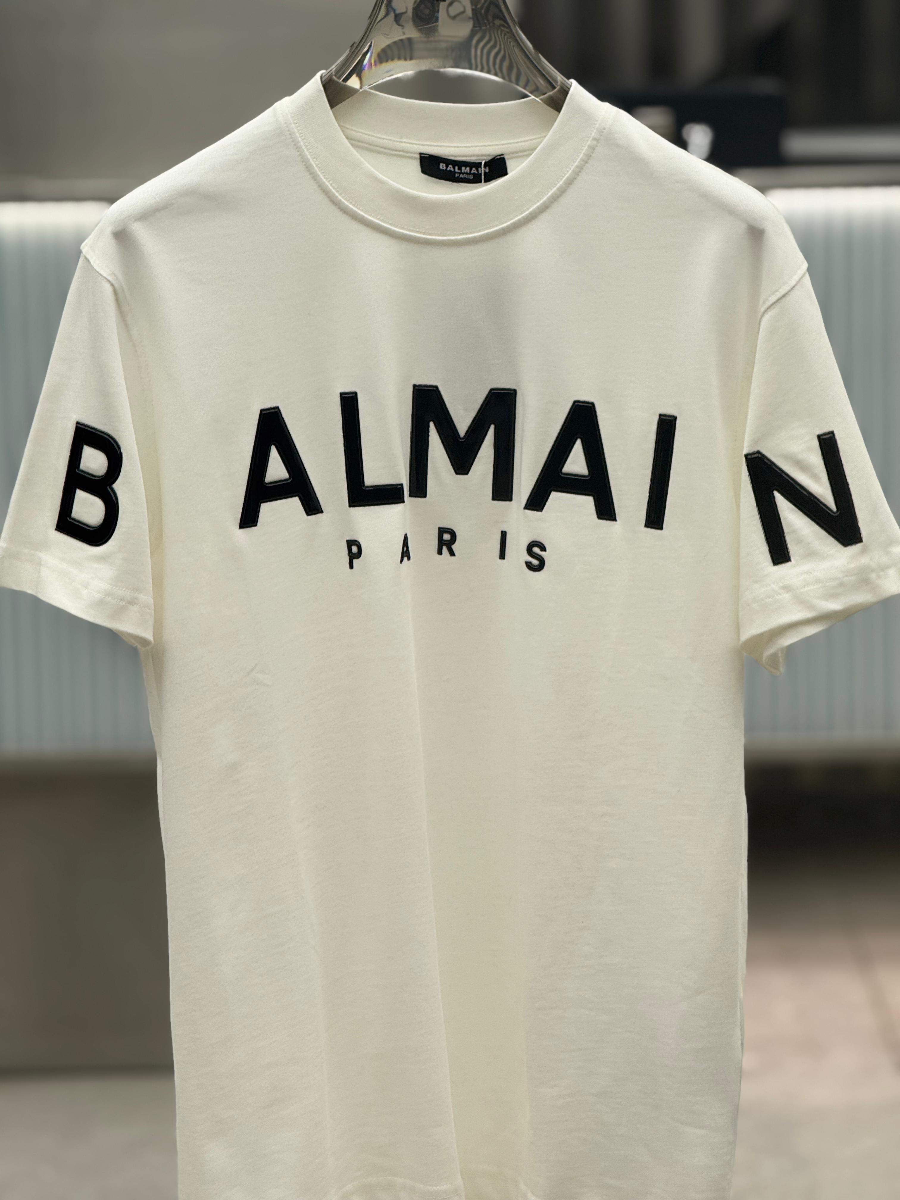 Balmain - Paris Logo Print Cotton T-Shirt in Off-White with Black Raised Lettering