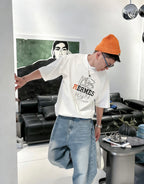 Hermès - "Optimiste" Graphic T-Shirt in White with Technical Horsebit Print