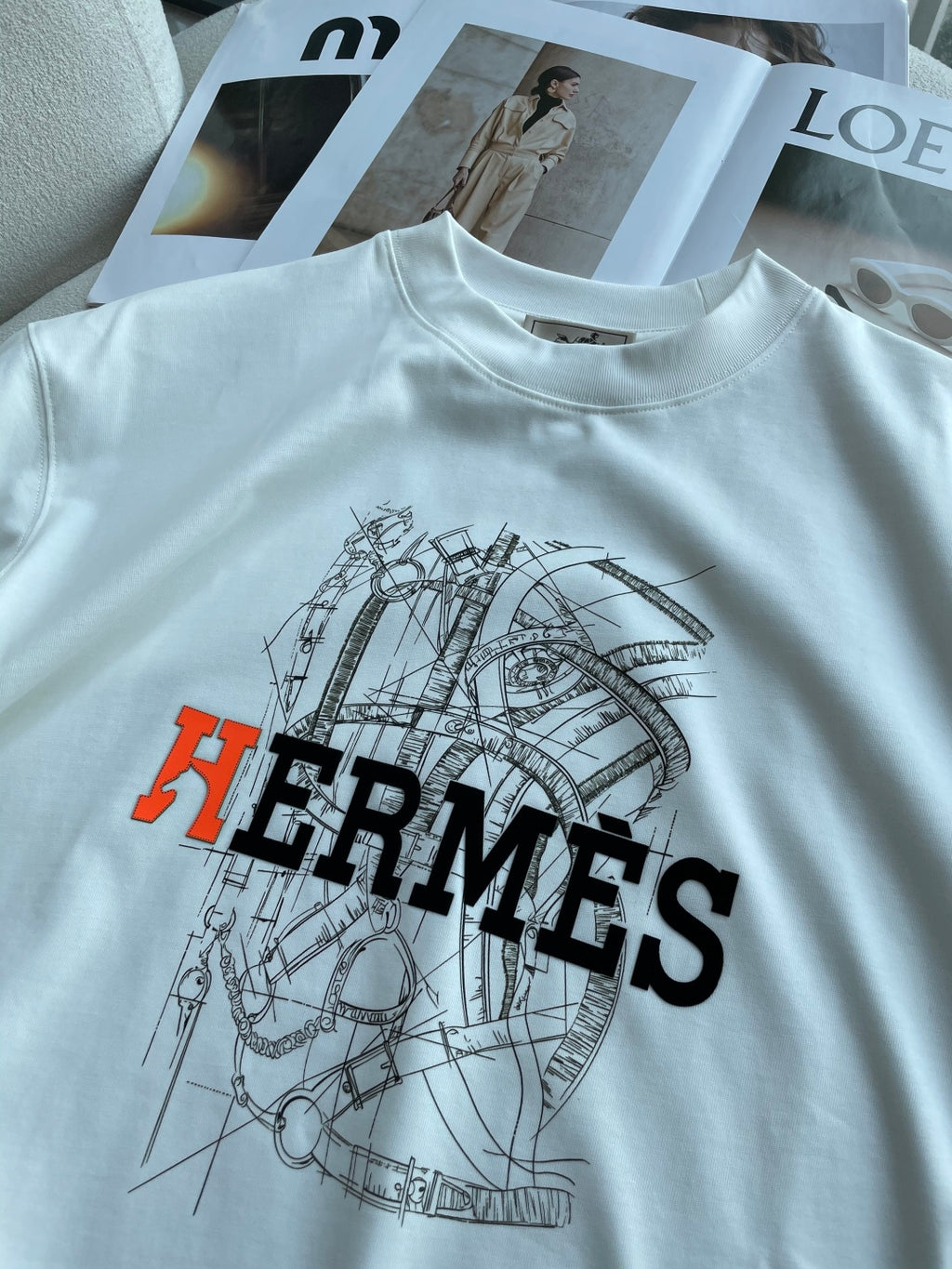Hermès - "Optimiste" Graphic T-Shirt in White with Technical Horsebit Print