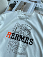 Hermès - "Optimiste" Graphic T-Shirt in White with Technical Horsebit Print