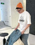 Hermès - "Optimiste" Graphic T-Shirt in White with Technical Horsebit Print