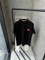 Hermès - Paris Cotton Jersey T-Shirt – Black with Signature Orange Leather Patch