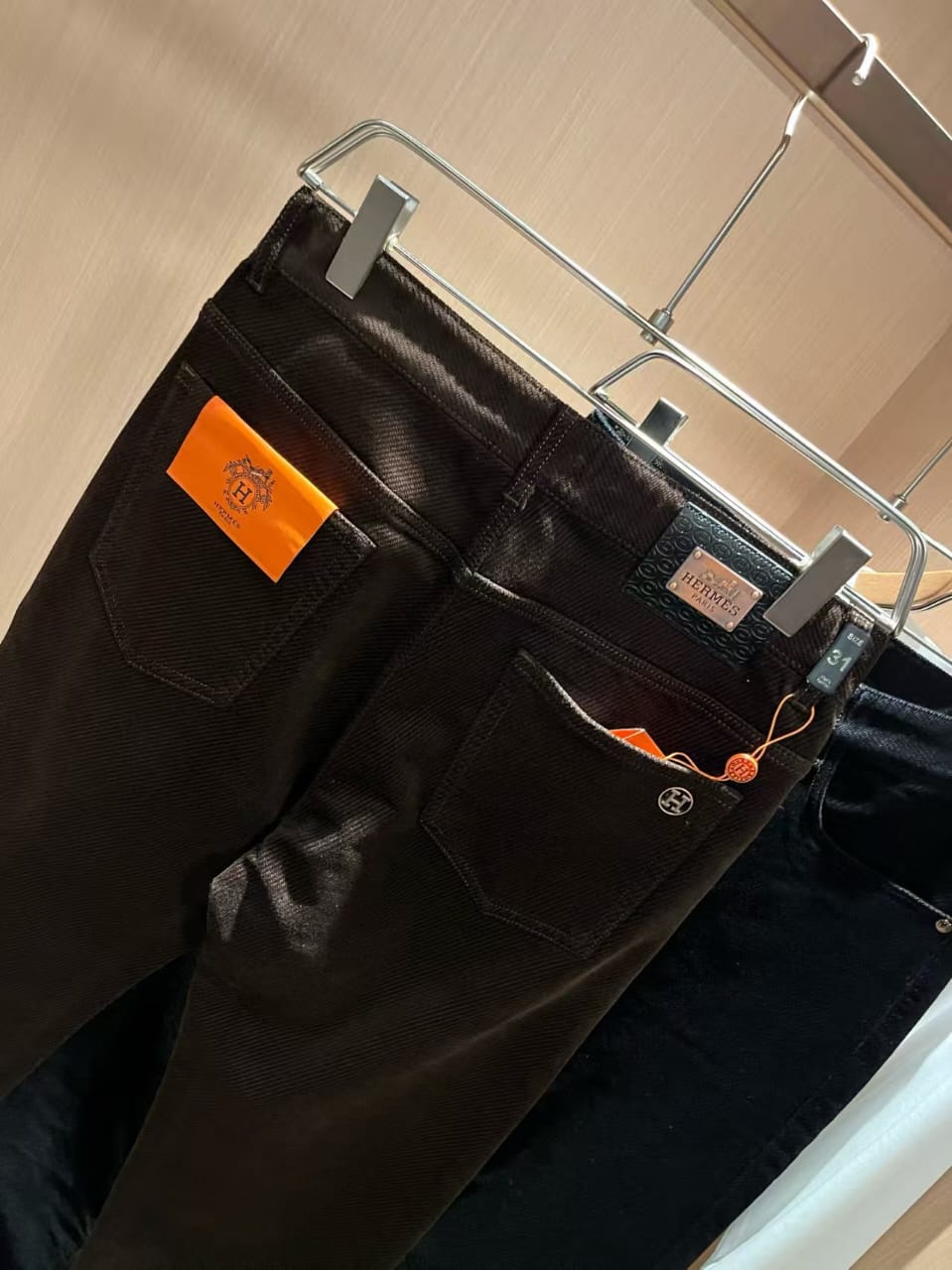 Hermès - Dark Brown Coated Denim Jeans