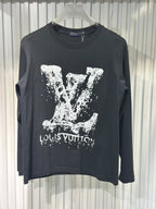 L V