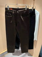 Hermès - Dark Brown Coated Denim Jeans