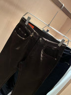 Hermès - Dark Brown Coated Denim Jeans