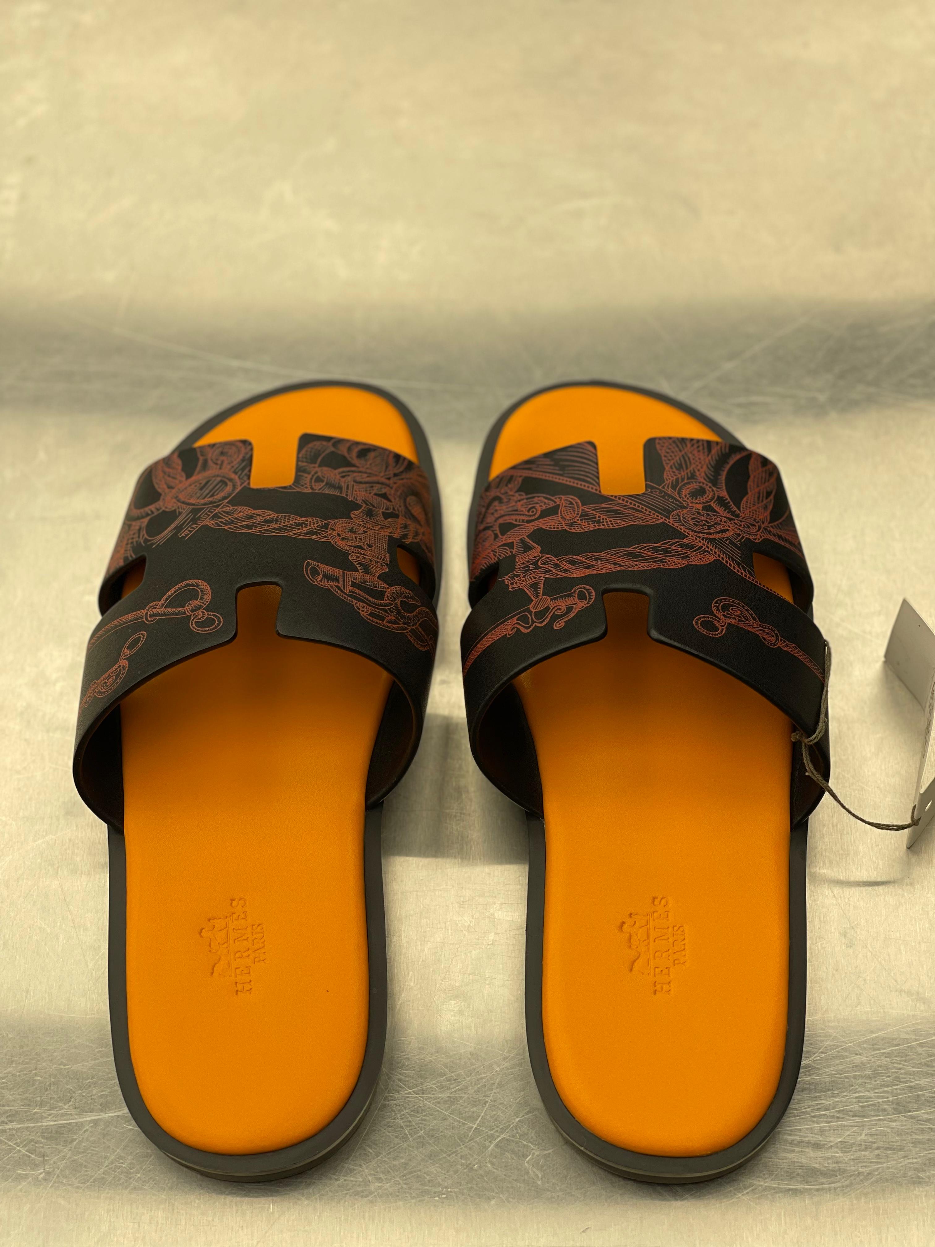 Hermes - Izmir Sandals in Black and Orange Leather