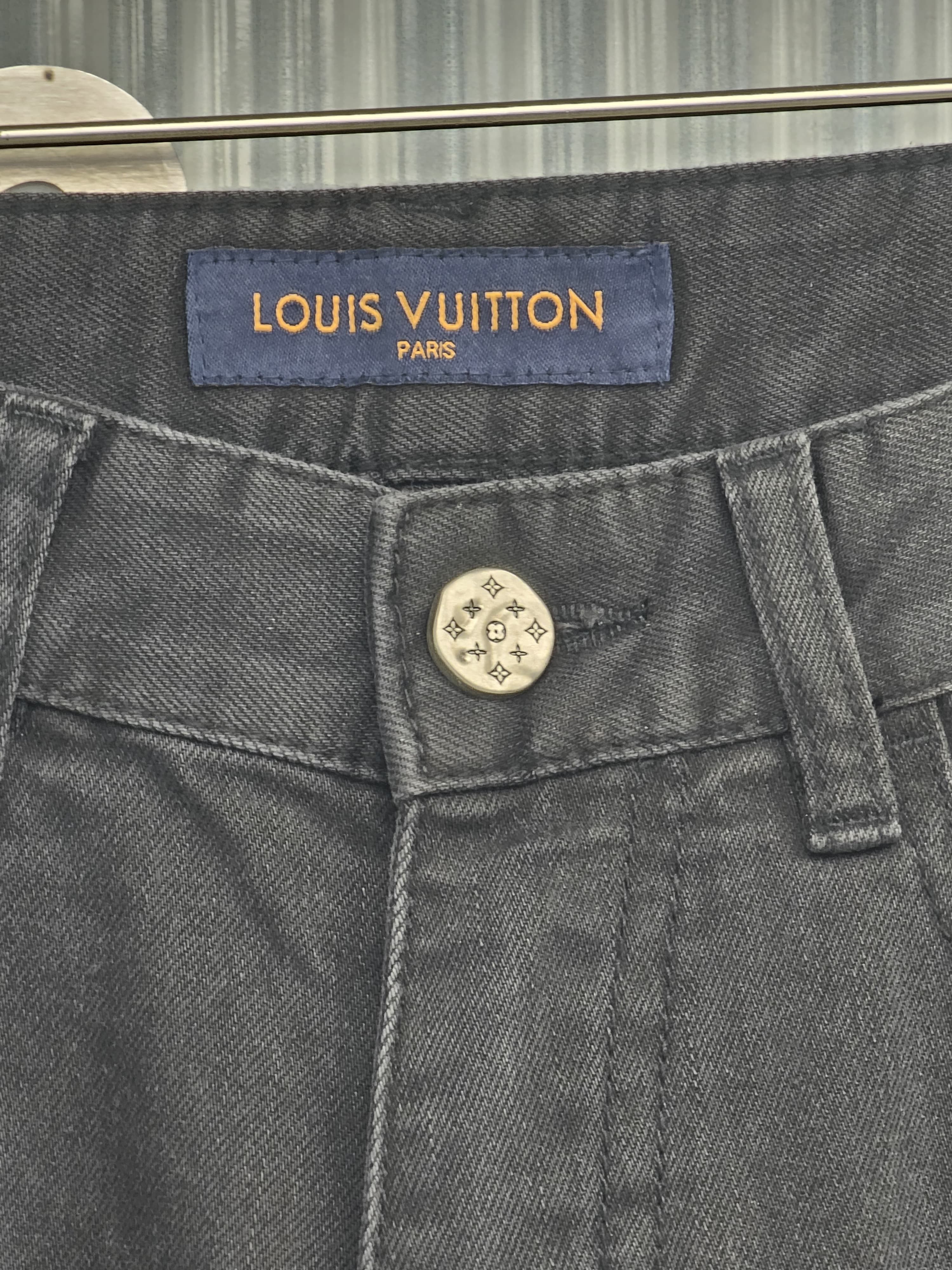 L V