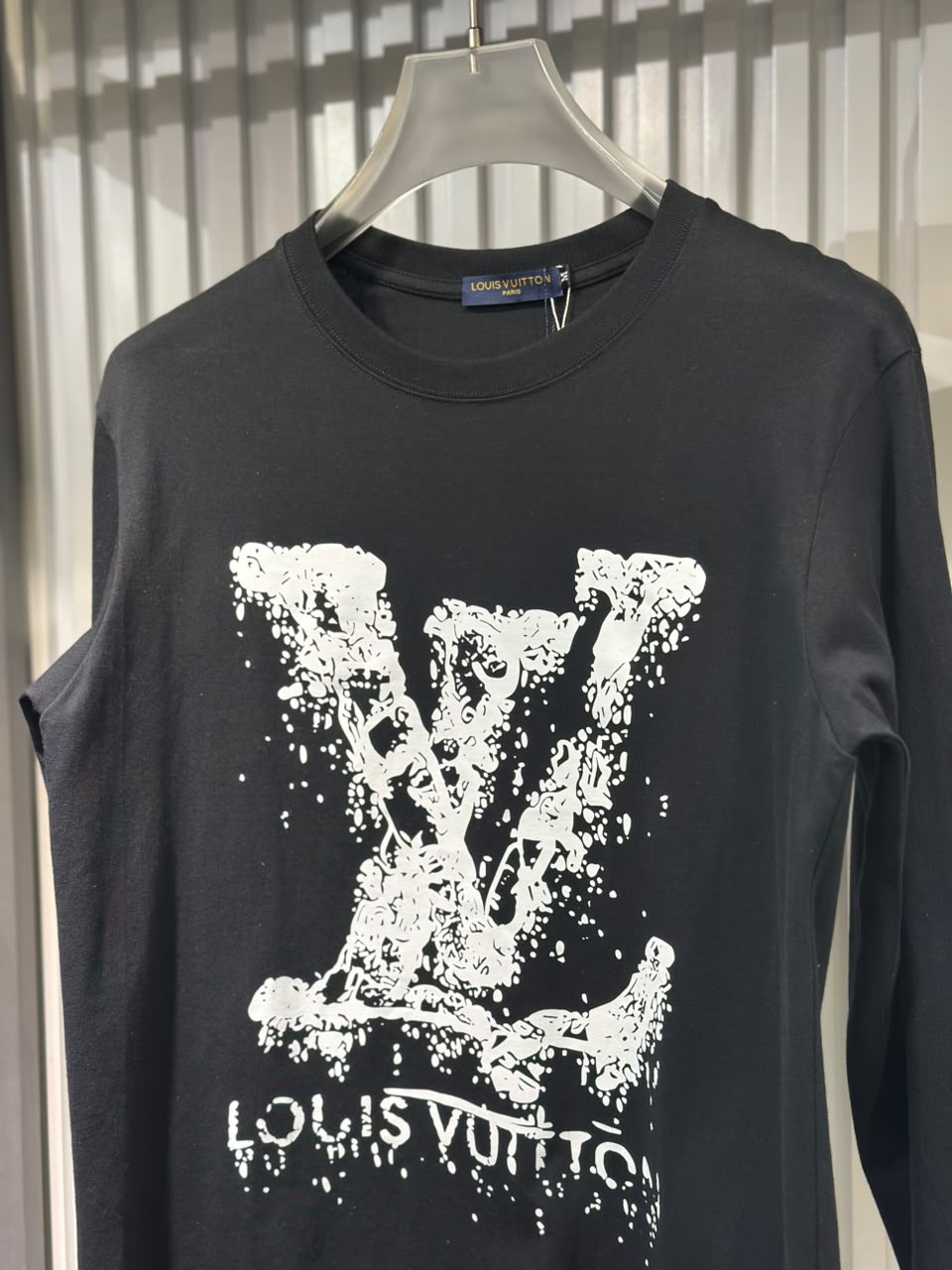 L V