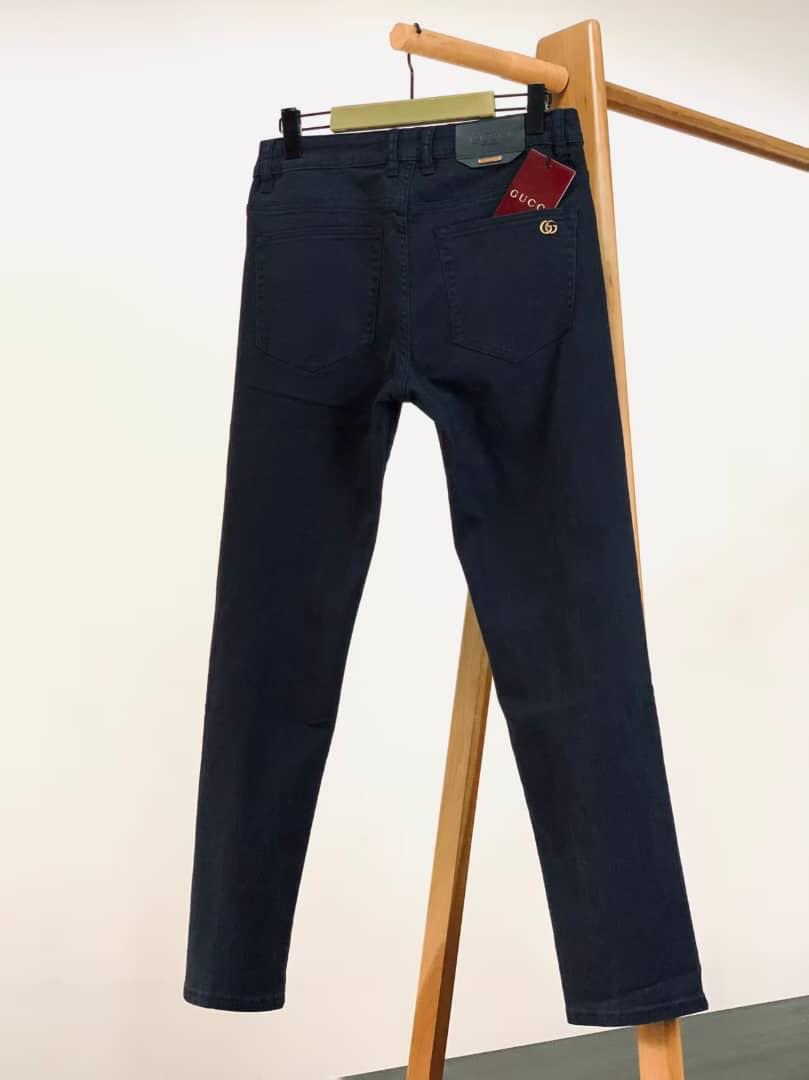 Gucci Men's Dark Wash Slim-Fit Denim Jeans with Signature Logo Patch