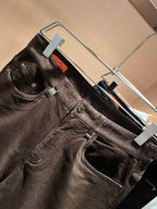 Hermès - Dark Brown Coated Denim Jeans